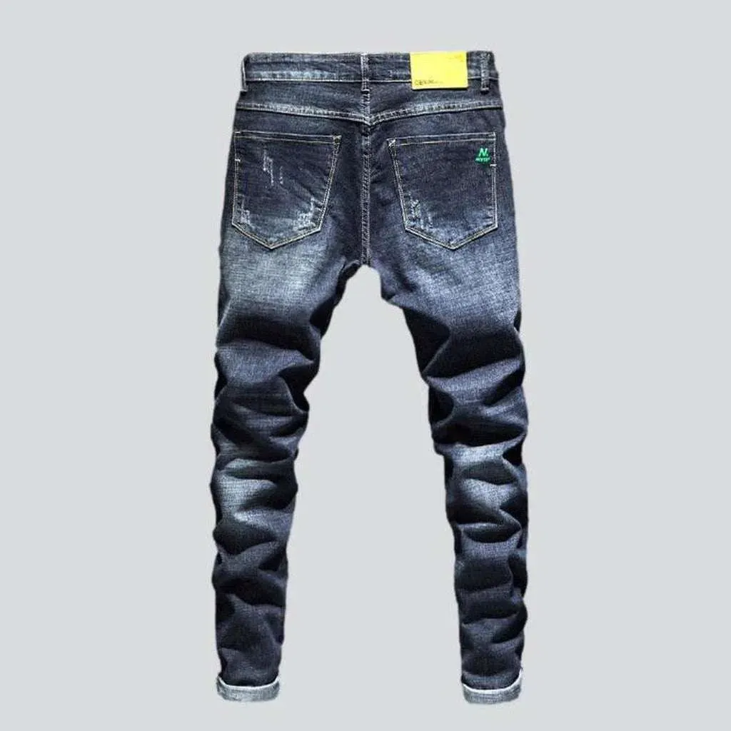 Dark wash men's ripped jeans