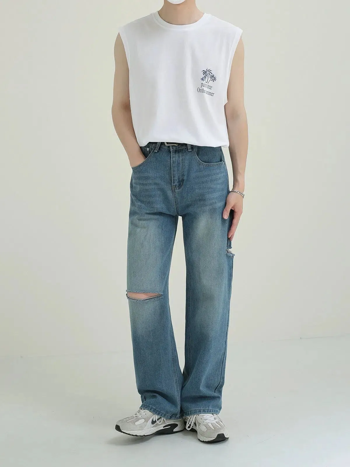 Zhou Faded & Whiskers Ripped Jeans